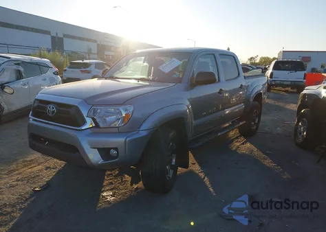 2014 Toyota Tacoma Base V6 z USA, uszkodzony, nr VIN 3TMLU4EN1EM144853